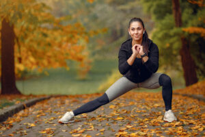 health tips for healthy life sports girl in a black top training in a autumn park